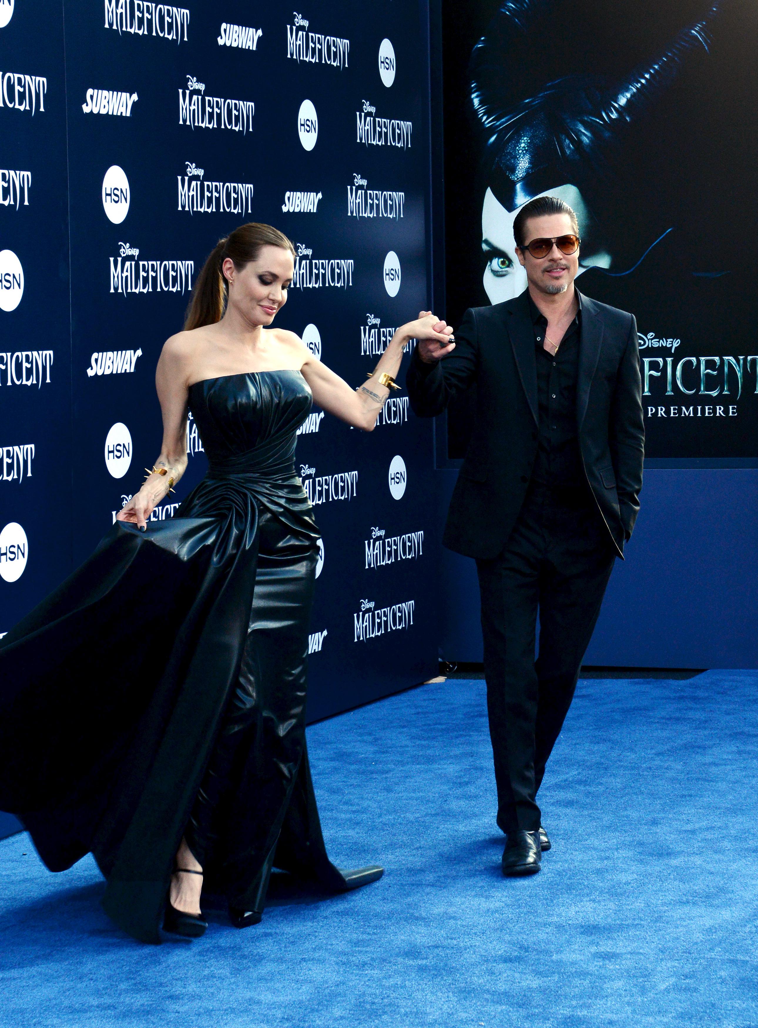 Angelina Jolie e Brad Pitt alla premiere di 'Maleficent' a Los Angeles (Infophoto)