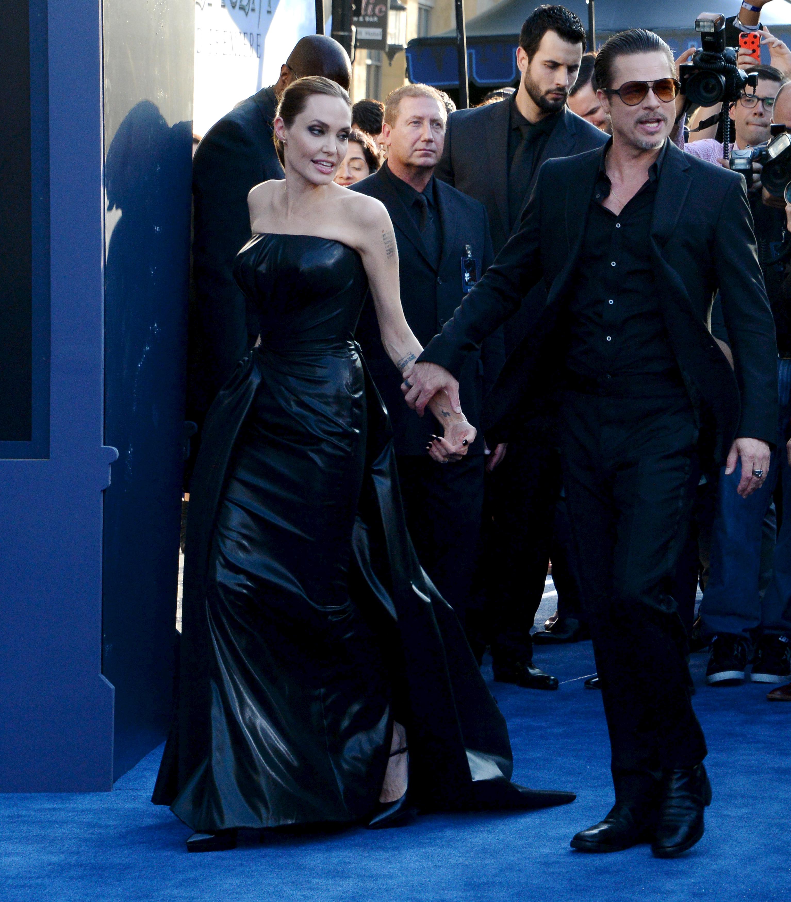 Angelina Jolie e Brad Pitt alla premiere di 'Maleficent' a Los Angeles (Infophoto)