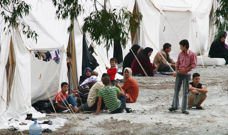 Un campo profughi siriano (Xinhua)