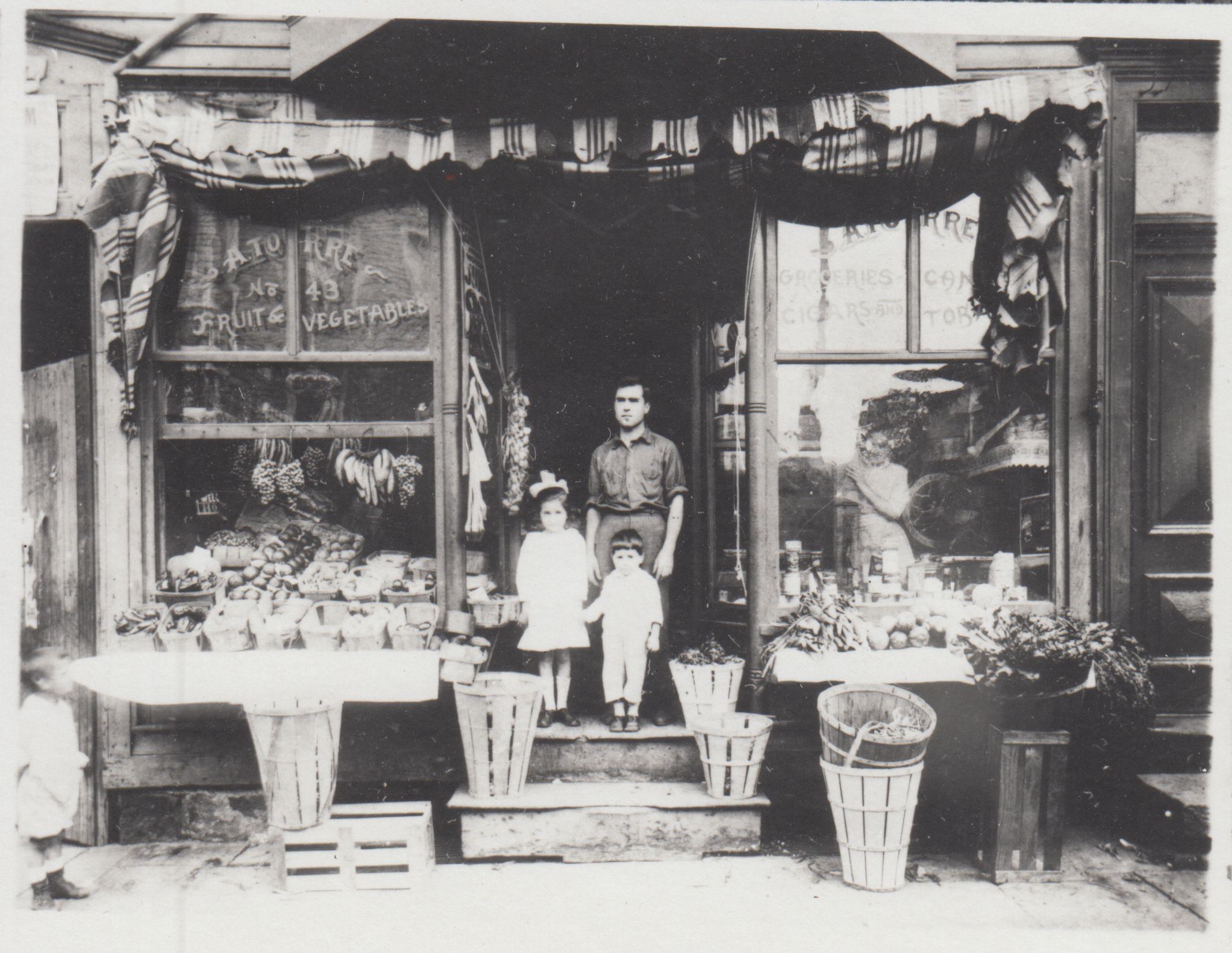 Photo Courtesy Center for Migration Studies, 1925 Al Torre and Family at their Fruit and Vegetable Stand in St Paternson, NJ