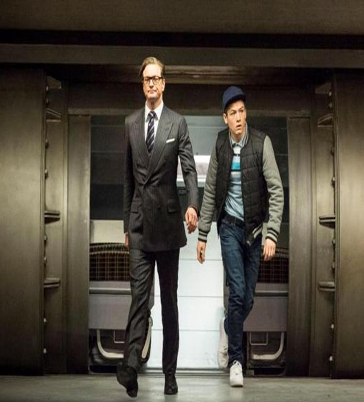 Colin Firth e il giovane Taron Egerton in 'Kingsman - Secret Service'