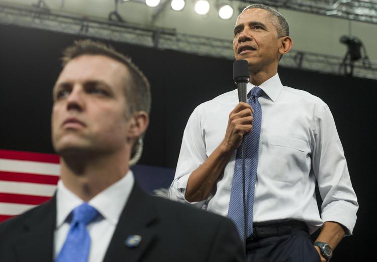 Agente del Secret Service protegge Barack Obama - (foto AFP)