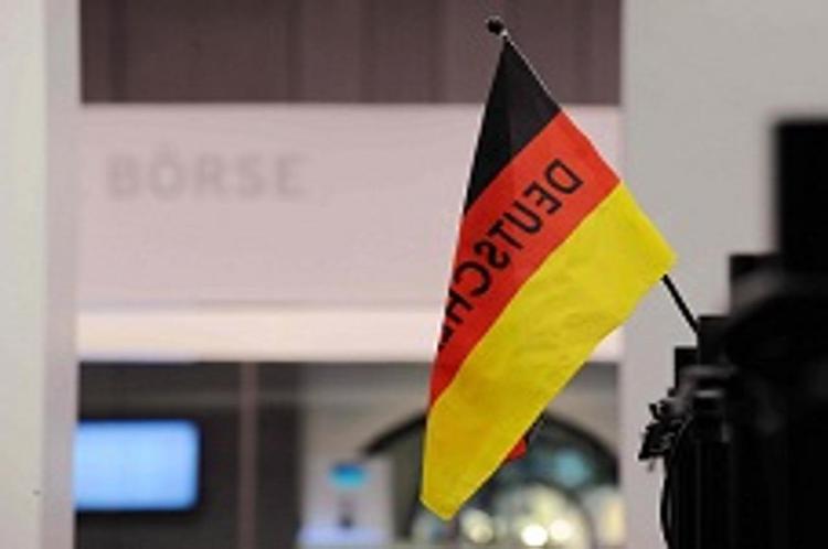 Orgoglio nazionale alla Borsa di Francoforte (Infophoto).