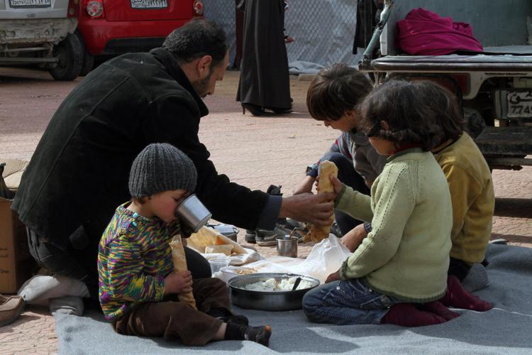 Sfollati siriani - (foto INFOPHOTO)