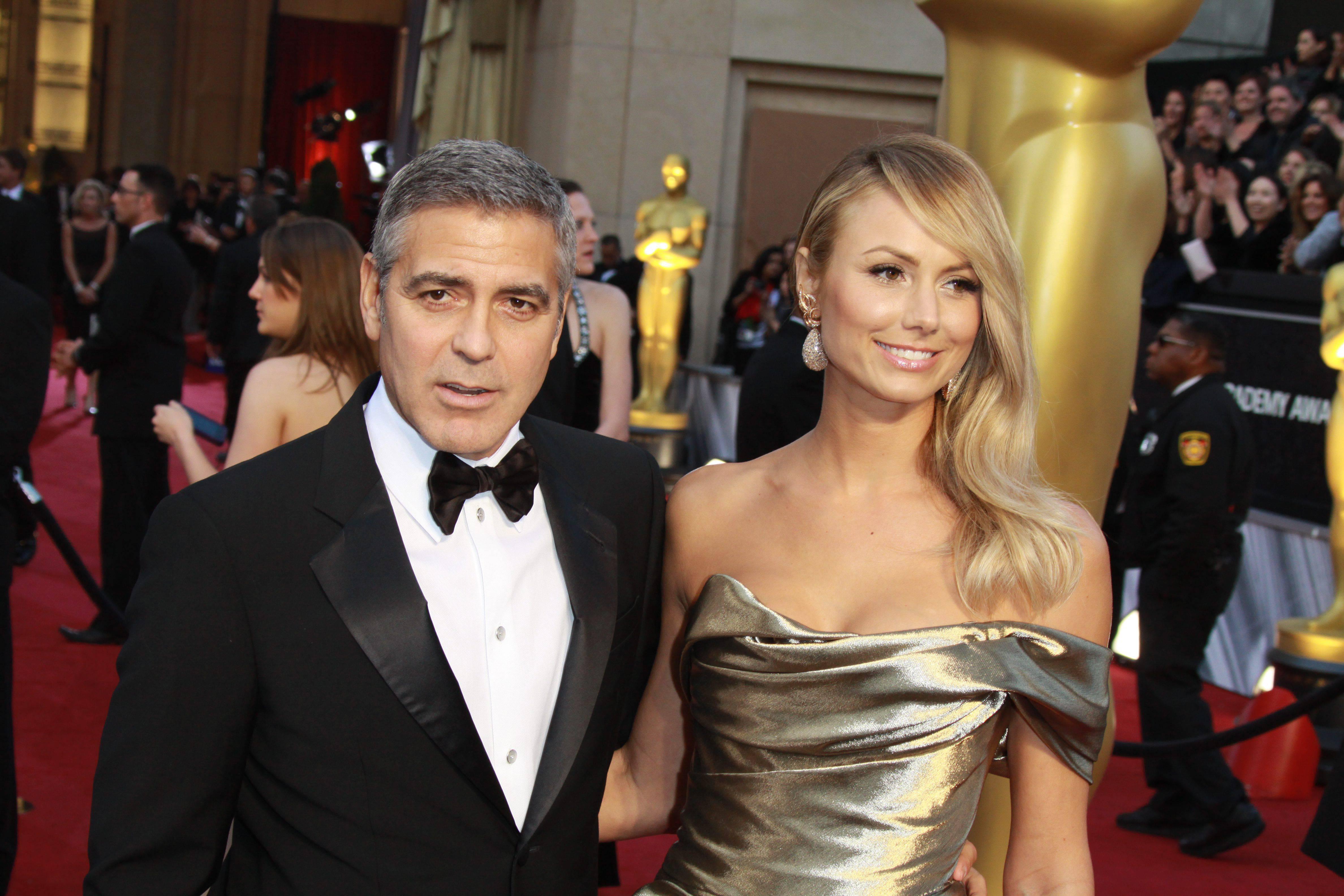 George Clooney e Stacy Keibler (Infophoto)