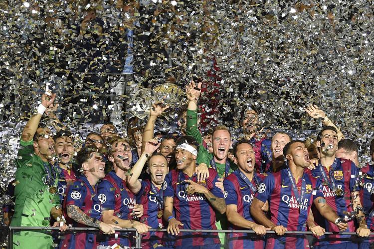 Il Barcellona  celebra la vittoria della Champions League (Foto Afp) - AFP