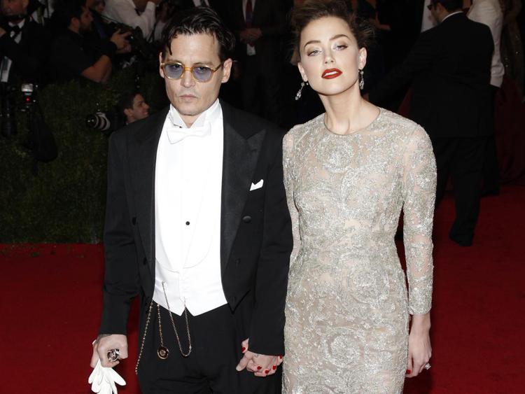 Johnny Depp e Amber Heard (foto Infophoto)