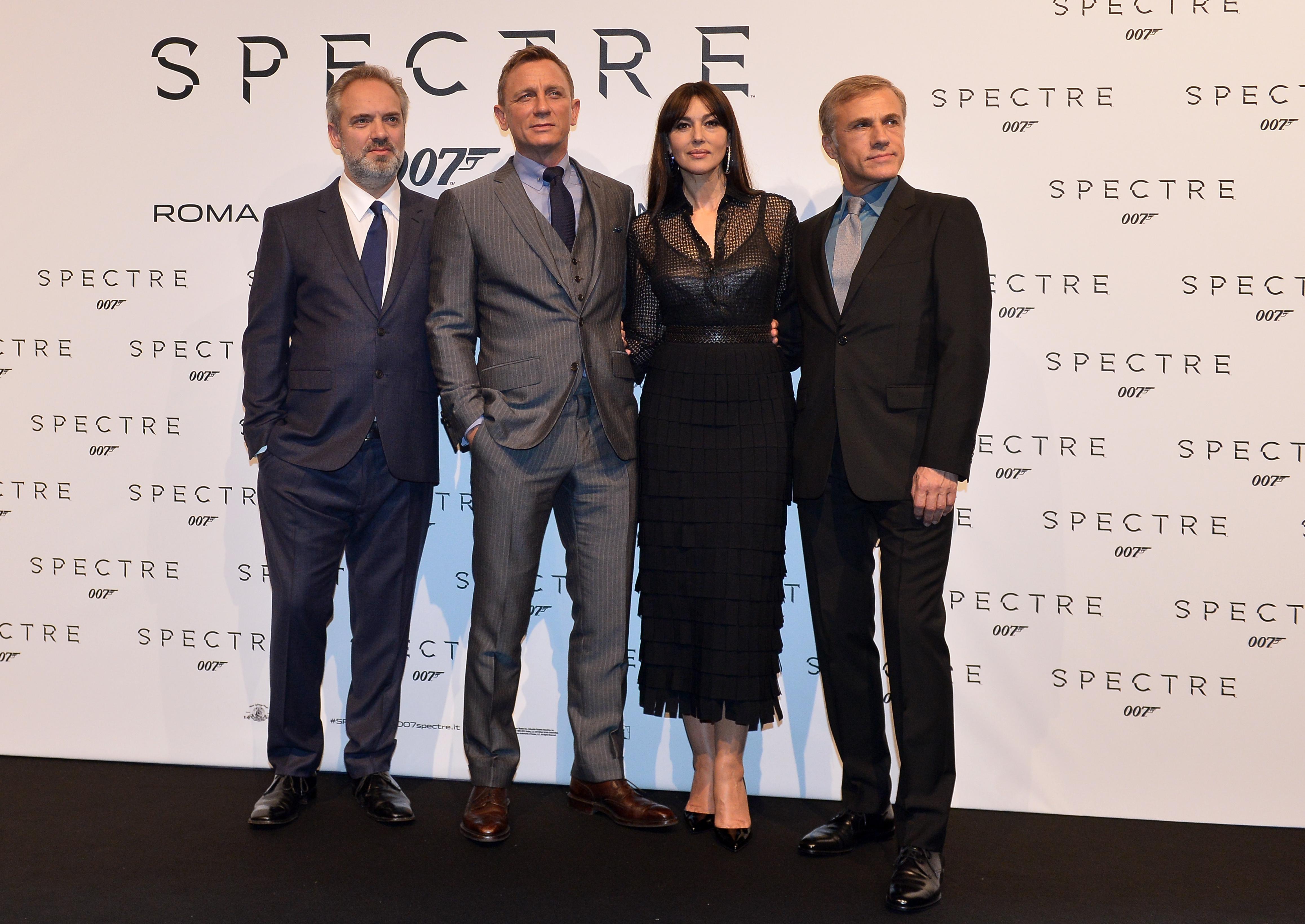 Da sinistra: il regista inglese Sam Mendes, Daniel Craig, Monica Bellucci e Christoph Waltz (Afp)