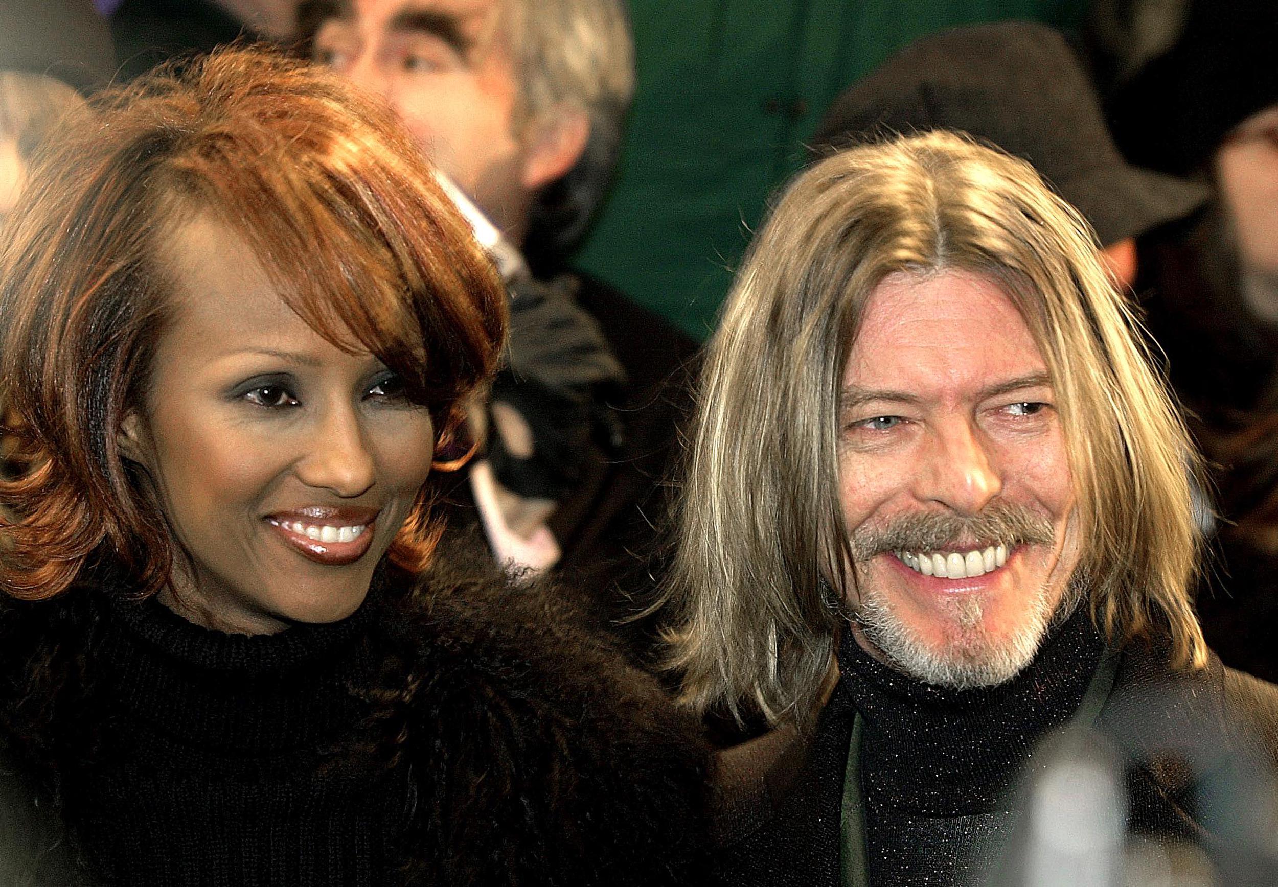  David Bowie e la moglie, la modella Iman  AFP PHOTO / FILES / Stan HONDA / AFP / STAN HONDA