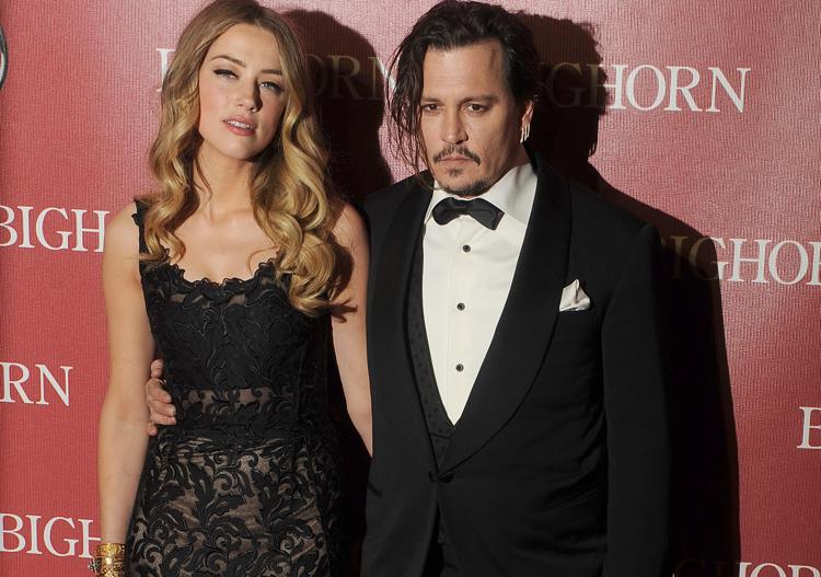 Amber Heard e Johnny Depp  (foto Fotogramma)