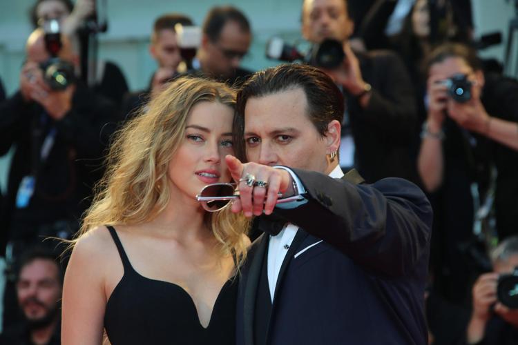 Johnny Depp e Amber Heard (FOTOGRAMMA) - (FOTOGRAMMA)