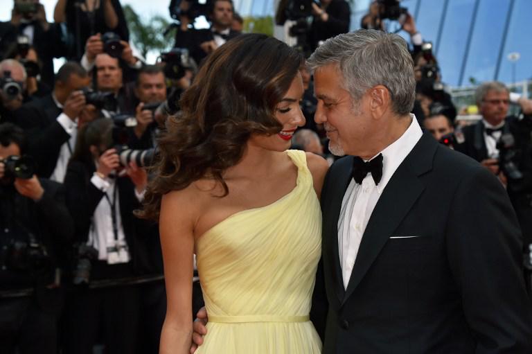 George Clooney e Amal Clooney AFP PHOTO / LOIC VENANCE