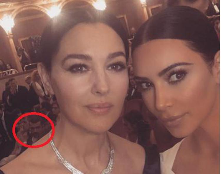 Nella foto Monica Bellucci e Kim Kardashian. Alle loro spalle Luca Argentero (Foto dal profilo Instagram di Kim Kardashian).  