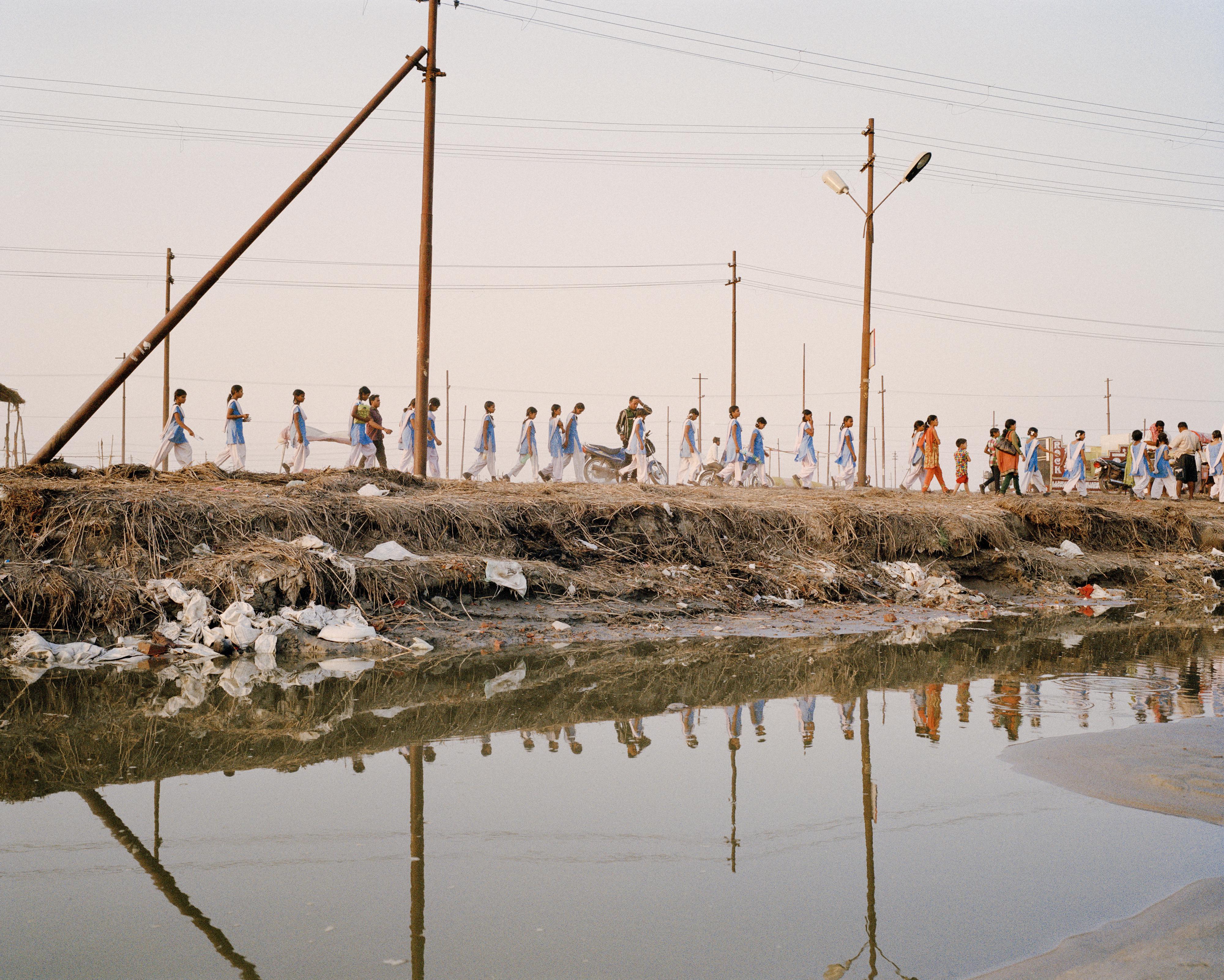 Pollution and pilgrims along the Ganges River, Allahabad, India, 2013. 