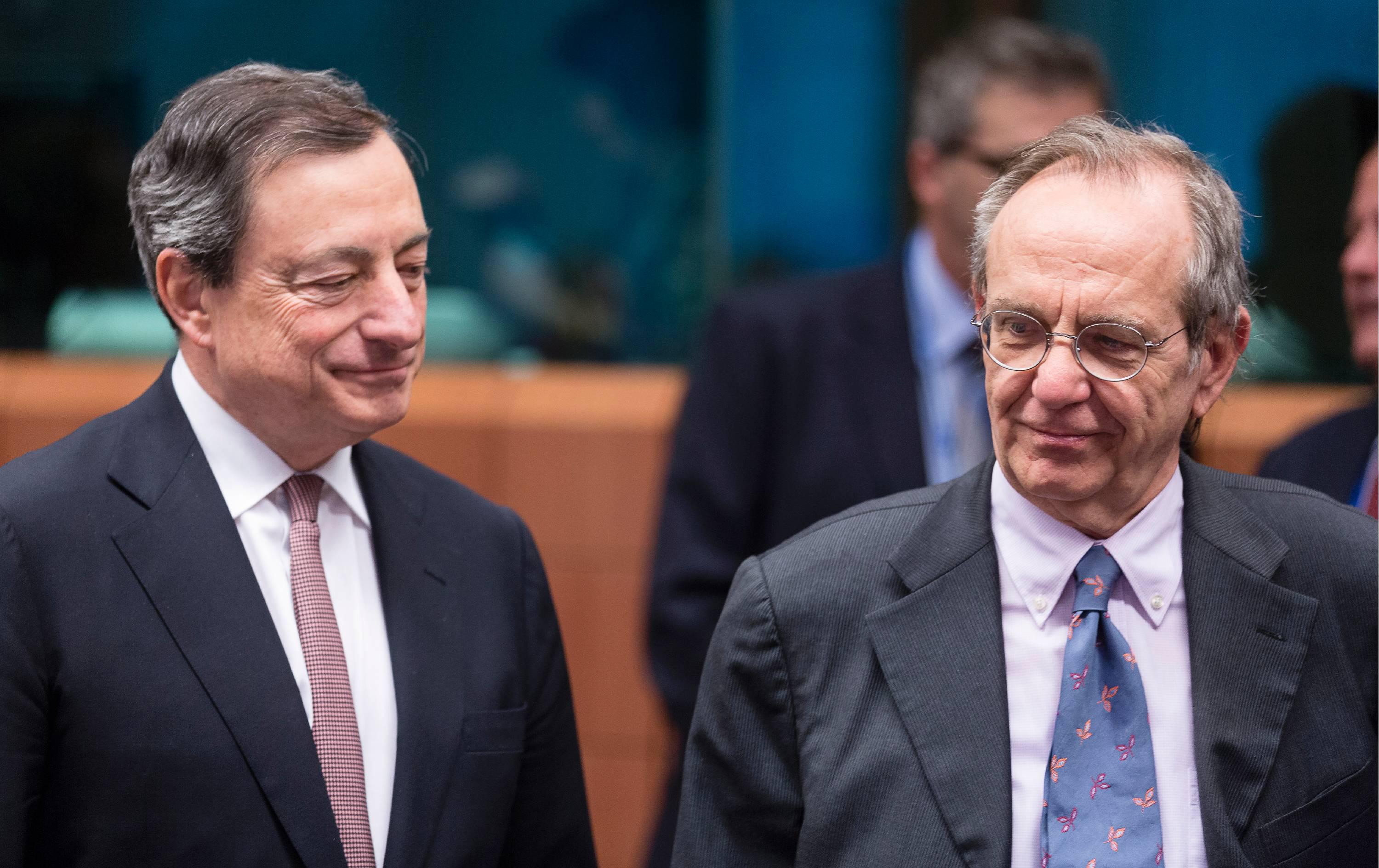  Mario Draghi e Pier Carlo Padoan (Fotogramma)