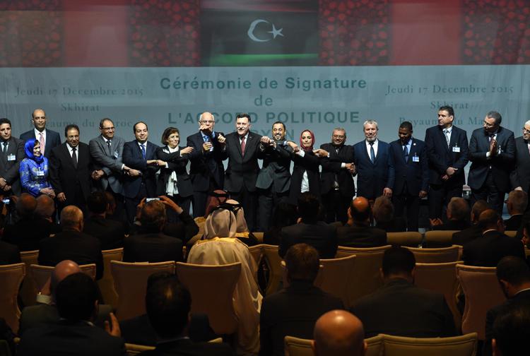Libyan lawmakers from rival parliaments after signing a deal on a unity government on December 17, 2015, in the Moroccan city of Skhirat.  - Photo: AFP