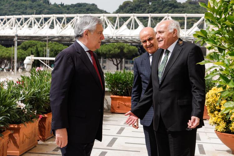 Italy's foreign minister Antonio Tajani (L) with Algerian counterpart Ahmed Attaf (R)