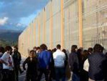 Three arrested during riot at migrant centre Three arrested during riot at migrant centre