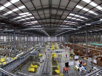 Amazon alza la paga Amazon alza la paga