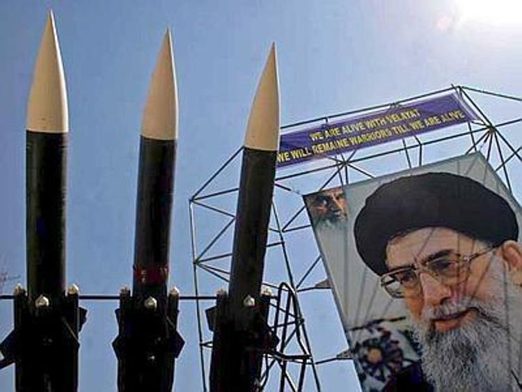 TEHRAN, IRAN: A large image of Iran's supreme leader Ayatollah Ali Khamenei is seen next to Surface to Air Missiles (SAM 6) during an exhibition marking the 26th anniversary of the outset of the Iran-Iraq war (1980-1988) in central Tehran on September 26, 2006. (Picture By©Mansoreh Motamedi) PHOTOGRAPH PROVIDED BY IBERPRESS +390670496984 www.iber-press.com - ©documentIRAN/IBERPRESS
