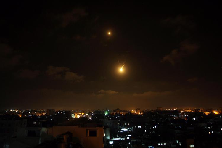 Flares are seen following an Israel airstrike over Gaza on July 3, 2014. Israeli warplanes launched the raids in the early morning hours on different targets in the Gaza Strip, injuring eight Palestinians UPI/Ismael Mohamad - Infophoto - INFOPHOTO