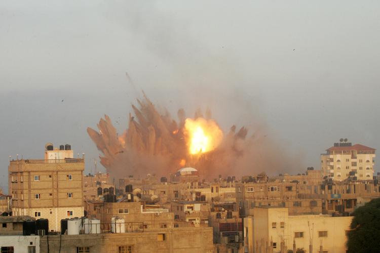 A ball of fire is seen following an Israeli air strike in Rafah in the southern Gaza on July 11, 2014. UPI/Ismael Mohamad - Infophoto - INFOPHOTO