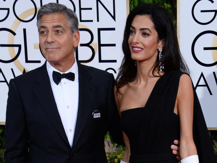 George Clooney e la moglie Amal Alamuddin alla 7eesima edizione dei Golden Globe (Foto Infophoto) - INFOPHOTO
