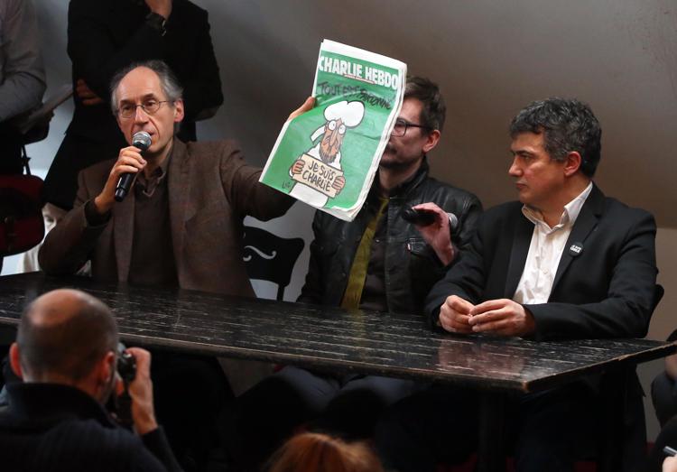 Giornalisti di Charlie Hebdo presentano il numero post attentato. - (INFOPHOTO)