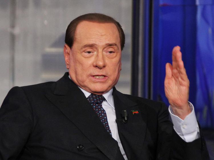 Nella foto Silvio Berlusconi (Infophoto)