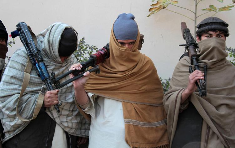 Talebani in armi (Infophoto)