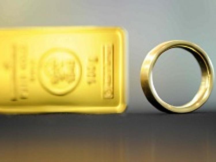Sale l'oro al Comex (Infophoto) - oro