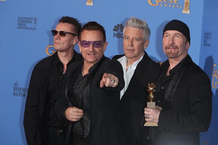 Gli U2 - Larry Mullen, Bono, Adam Clayton e The Edge (Foto Infophoto) - INFOPHOTO