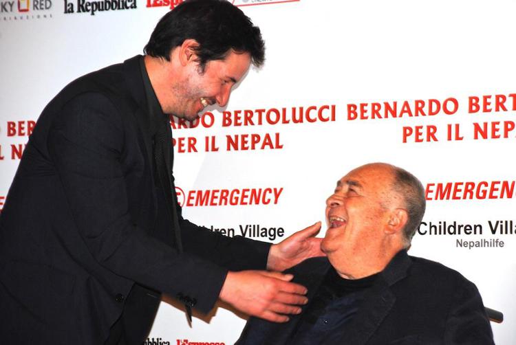 Bernardo Bertolucci e Keanu Reeves (Adnkronos)
