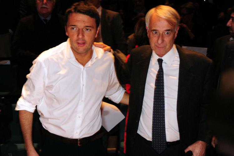 Matteo Renzi e Giuliano Pisapia (Infophoto)