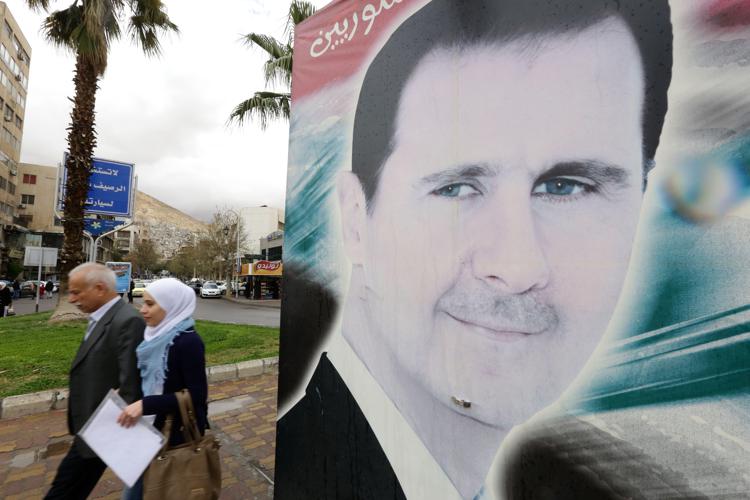 Un ritratto del presidente siriano Bashar al-Assad (Foto Afp) - AFP