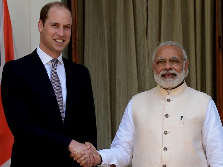 Il principe William e il primo ministro indiano Narendra Modi (Afp)
