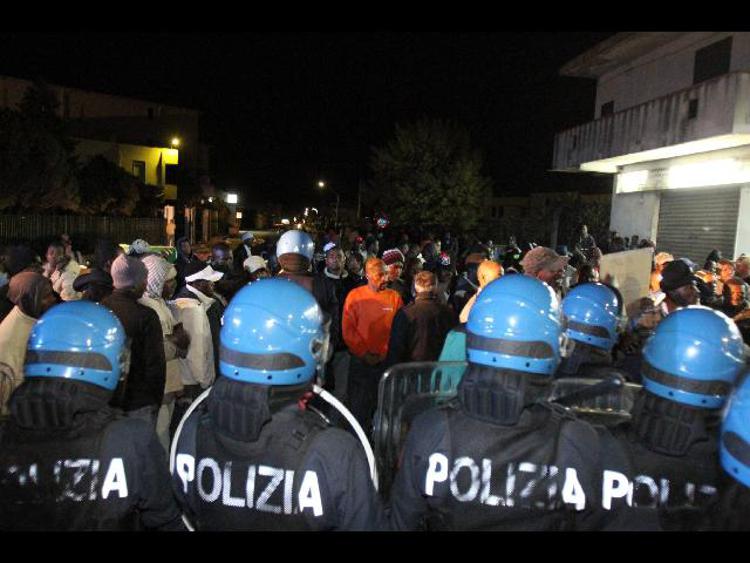 Migrants protest fatal shooting in southern Italy