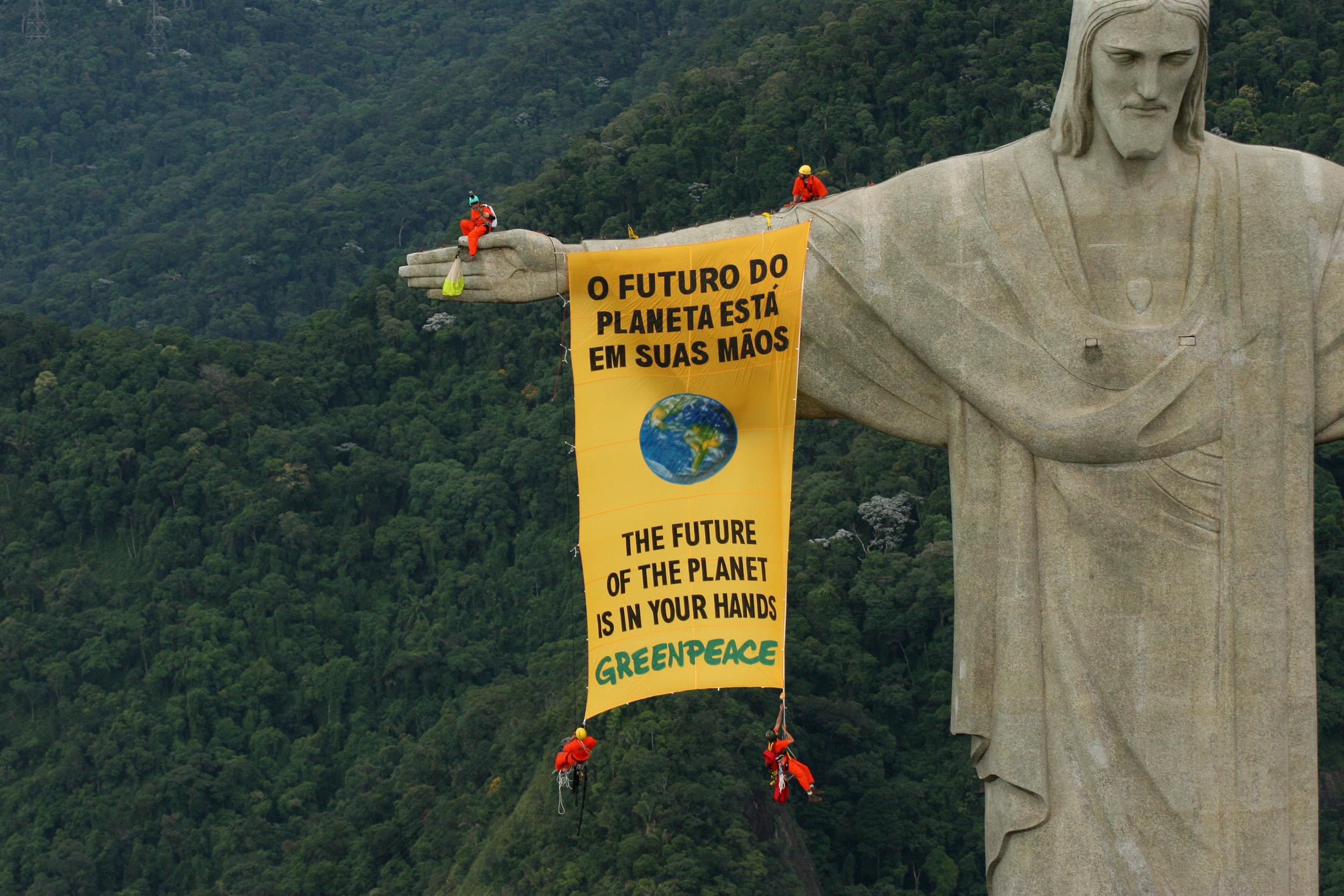 Greenpeace activists unfurl a banner from the famous Christ the Redeemer statue in Rio de Janeiro to call on governments to protect global biodiversity. Meanwhile, one of the activists tried to parachute from the statue, but had to rappel down. The action corresponds with the timing of the Convention of Biological Diversity (CBD) in Curitiba, Brazil, where representatives from 188 countries discuss the protection of biodiversity.