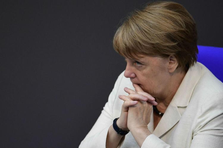 Merkel opposes Kurz proposal to ditch migrant quotas