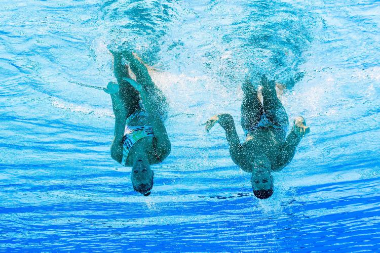 Gli azzurri Manila Flamini e Giorgio Minisini nel duo misto ai Mondiali di nuoto  - AFP