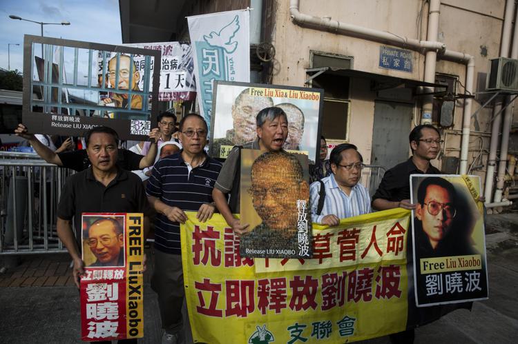 Attivisti pro Liu Xiaobo (AFP PHOTO) - (AFP PHOTO)