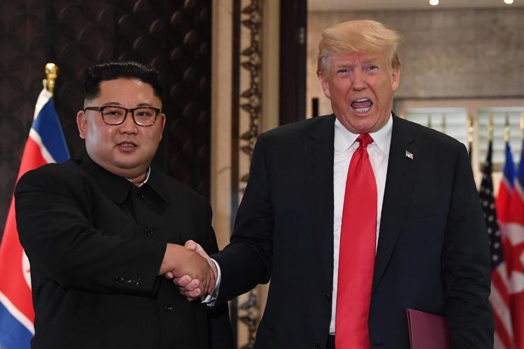 Donald Trump e Kim Jong-Un (AFP PHOTO)