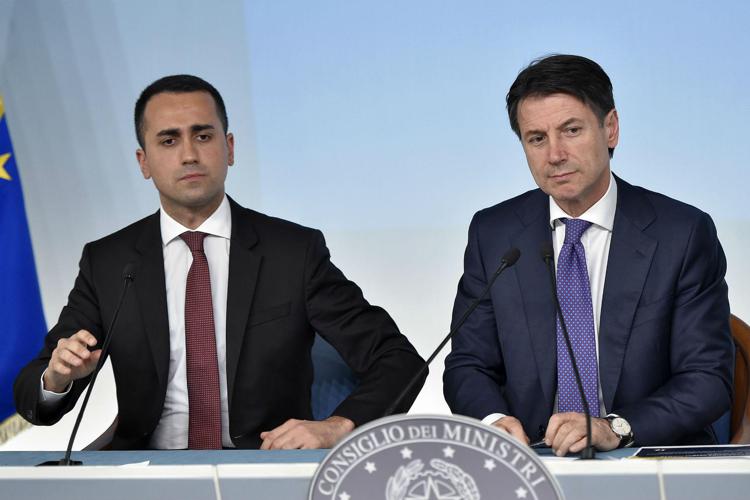 Luigi Di Maio (L) and Giuseppe Conte (R)