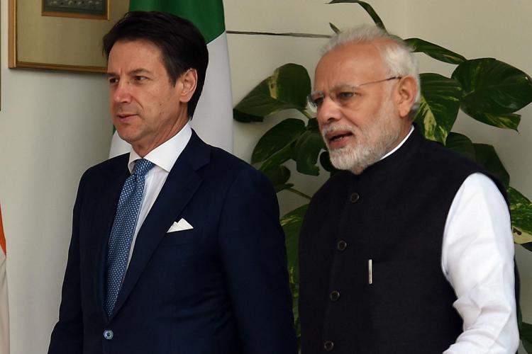 Giuseppe Conte (L) with Narendra Modi (R) during his visit to India in October 2018  - Photo: AFP