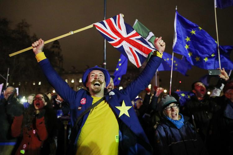 An anit-Brexit demonstrator reacts to the result of the vote on the Brexit deal in London on Jan. 15, 2019. MUST CREDIT: Bloomberg photo by Simon Dawson. - Bloomberg