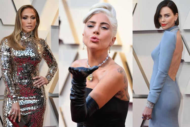 J.Lo (Afp), Lady Gaga (Ipa) e Charlize Theron sul red carpet degli Oscar 2019