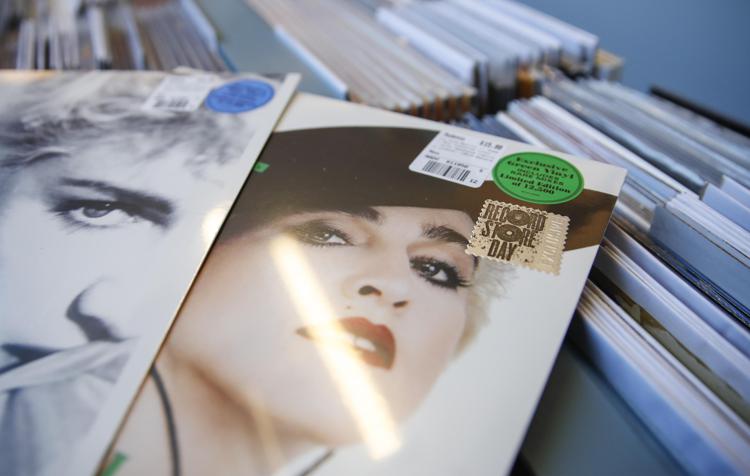 Madonna's special edition vinyl records sit on display at Dusty Groove music store during the Record Store Day in Chicago on April 13, 2019. - Record Store Day was founded in 2007 and is now celebrated at stores around the world, with hundreds of recording and other artists participating in the day by making special appearances, performances, meet and greets with their fans, the holding of fund raisers for community non-profits, and the issuing of special vinyl releases. (Photo by KAMIL KRZACZYNSKI / AFP) - AFP