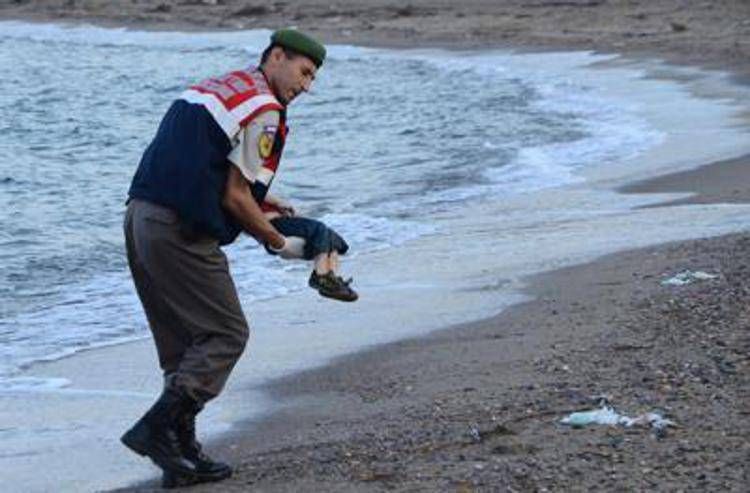 The lifeless body of three-year old Syrian refugee Aylan Kurdi who drowned off Turkey in Sept. 2015