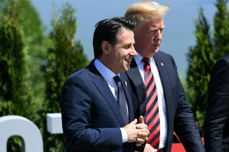 Italian premier Giuseppe Conte (L) with US president Donald Trump (R)