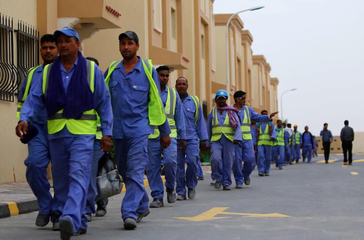 Foreign labourers working on the construction site of the al-Wakrah football stadium, one of the Qatar's 2022 World Cup stadiums.Photo: AFP